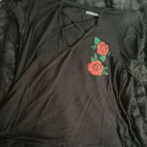 Black cross chest shirt with rose graphic